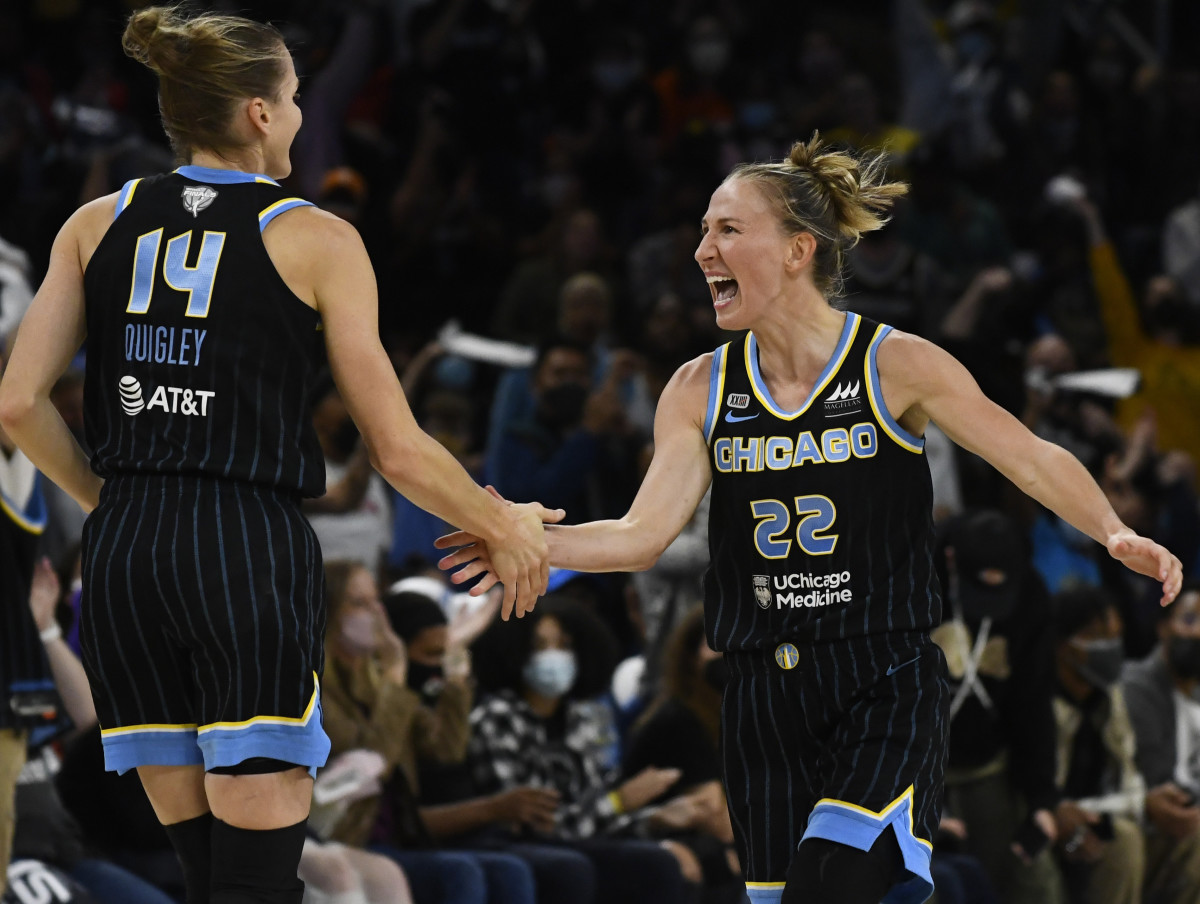 Allie Quigley high-fives Courtney Vandersloot